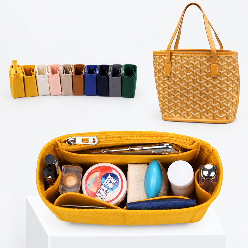 Yellow felt organizer insert for Goyard Saint Louis Mini filled with cosmetics, with a row of colored inserts behind