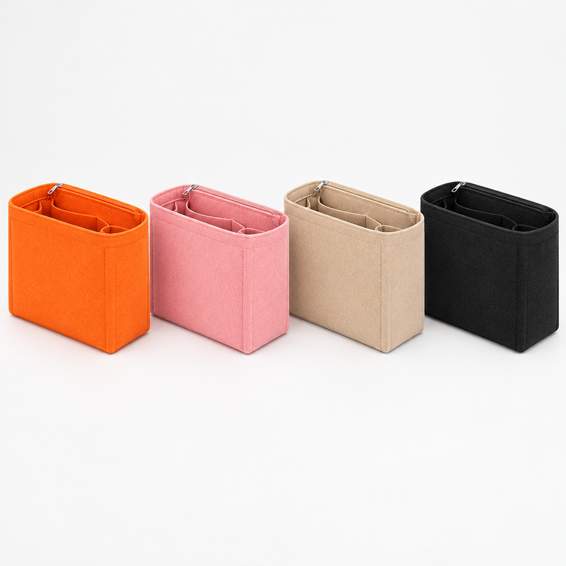 Orange, pink, beige and black felt organizer inserts, angled side view