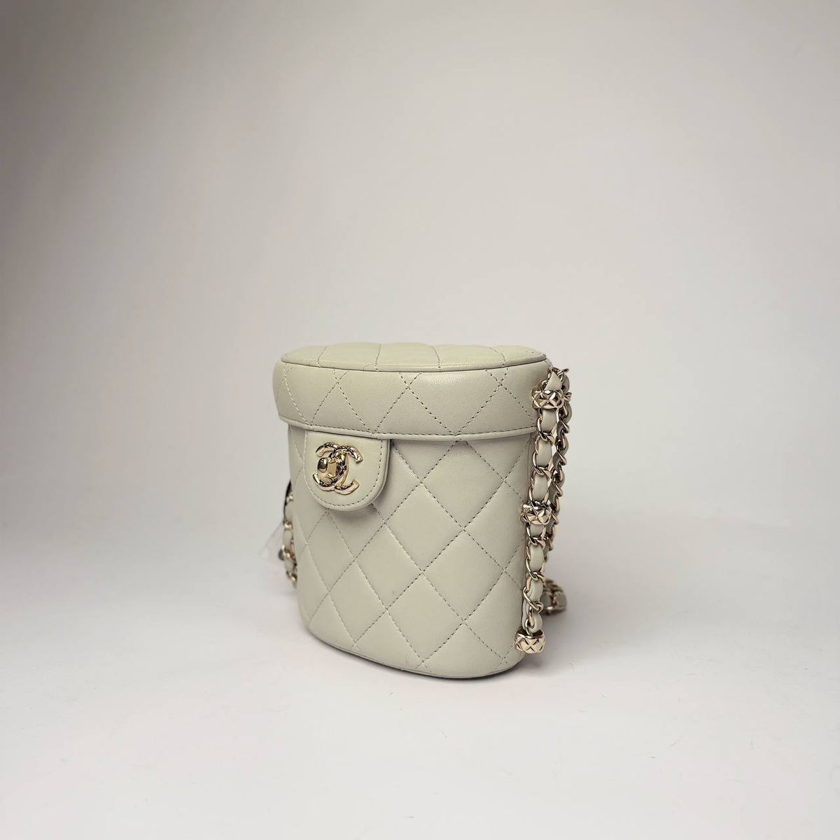 Chanel Mini Vanity Case with Chain, angled side view with chain