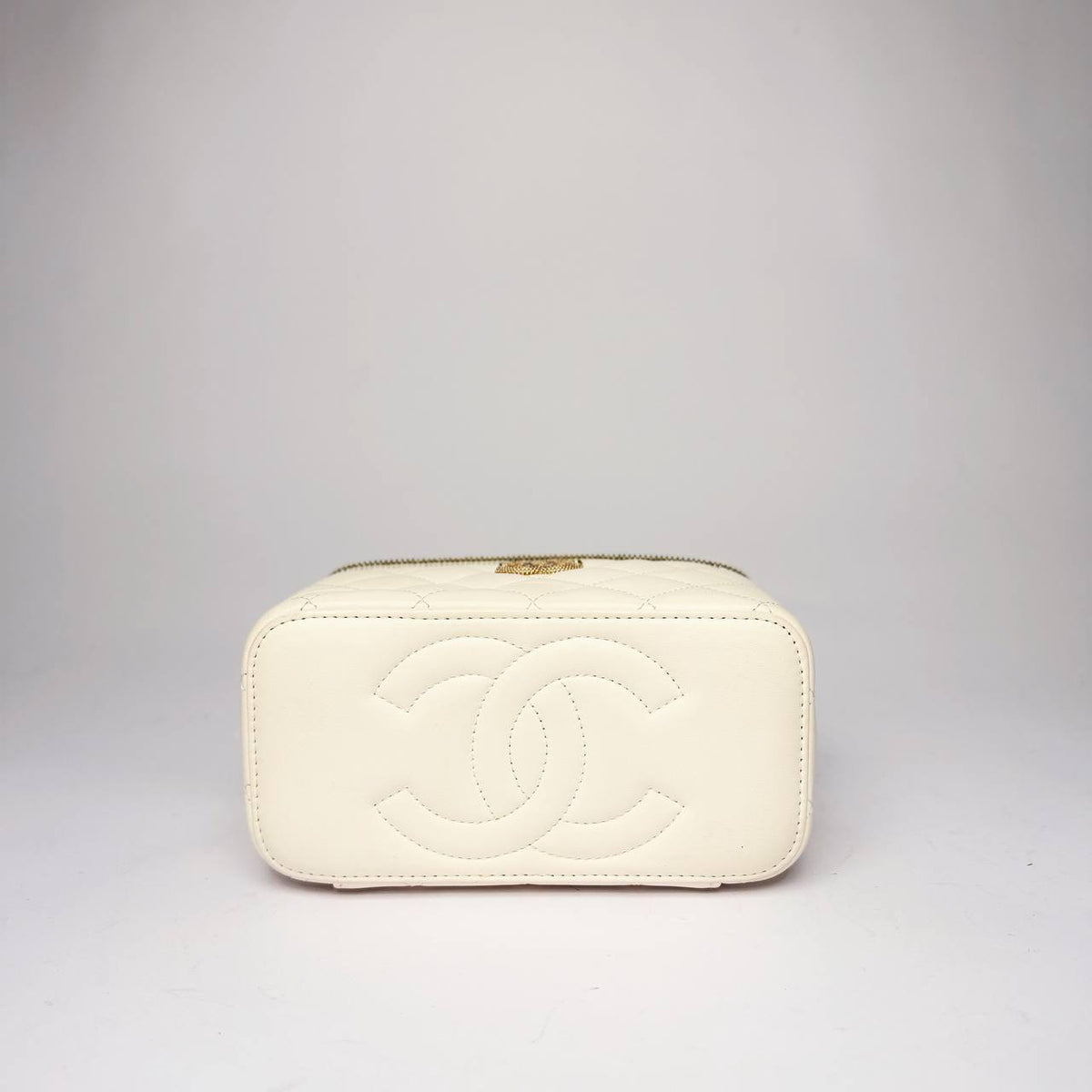 Chanel Vanity Case white leather, base view with stitched CC logo