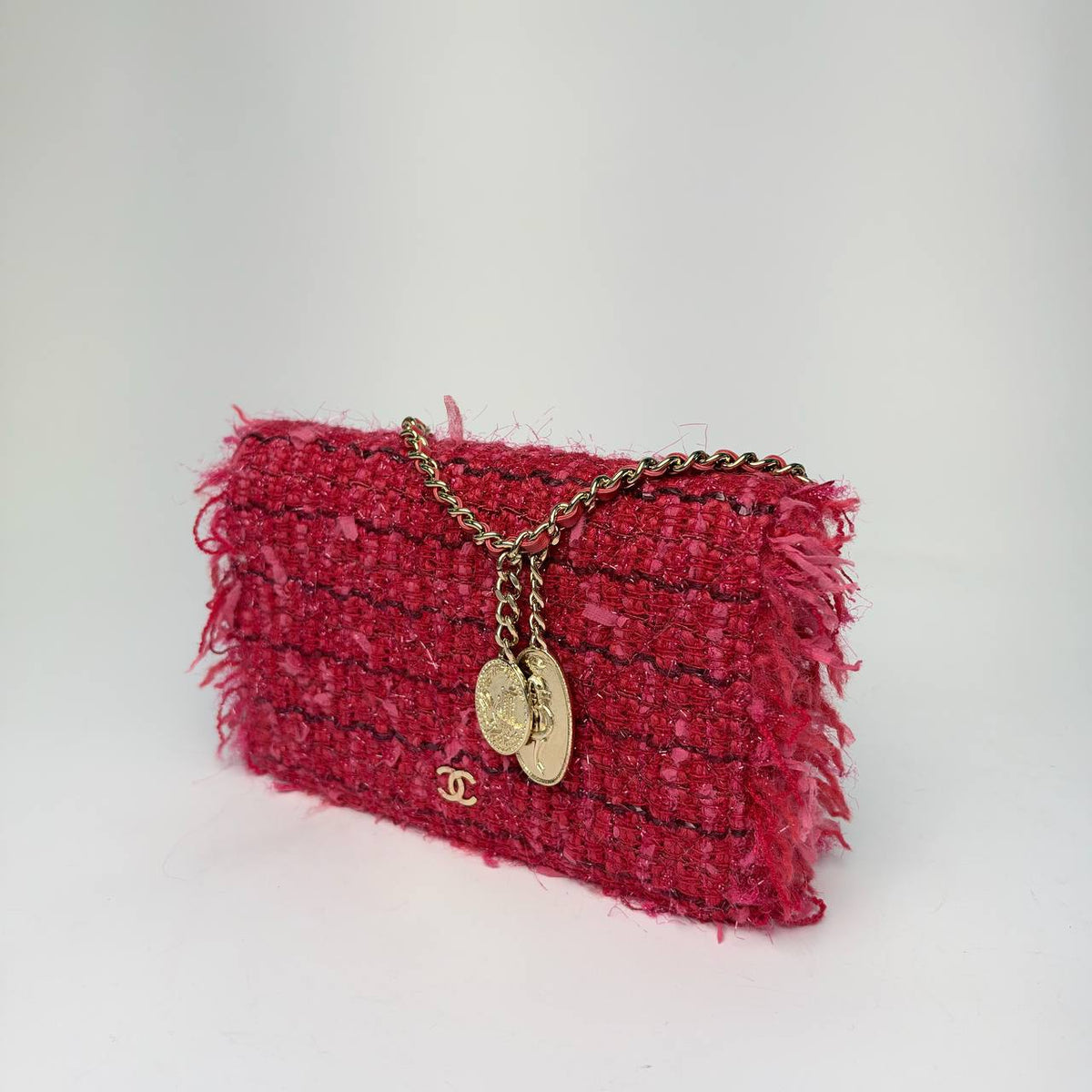 Chanel Tweed Wallet on Chain red and pink, three-quarter side view showing the fringed edges