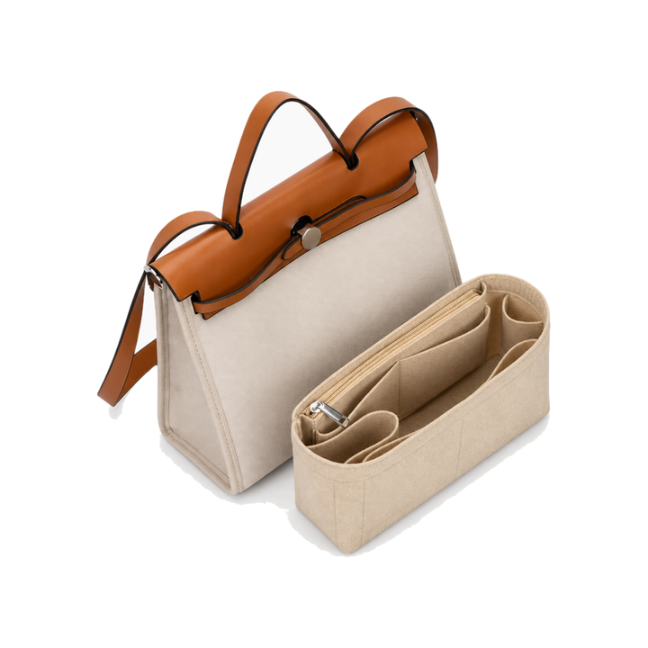Beige felt bag organizer insert with zipper pocket shown beside a Hermès Herbag 31 (bag not included)