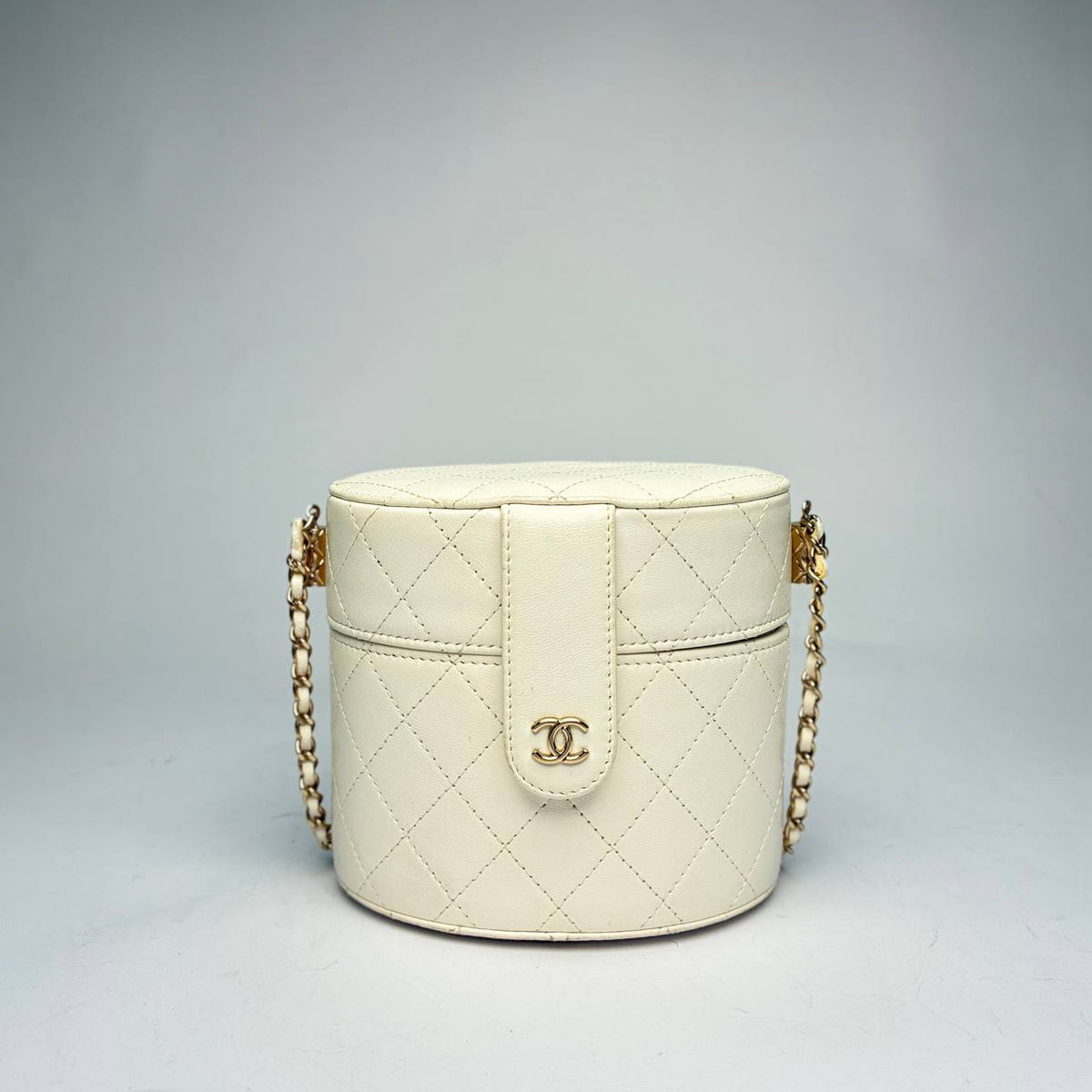 Chanel Round Mini Vanity Case with Chain in white quilted leather with gold-tone hardware, front view