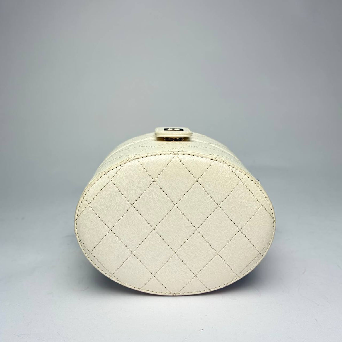 Chanel Round Mini Vanity Case white, view of the quilted oval end