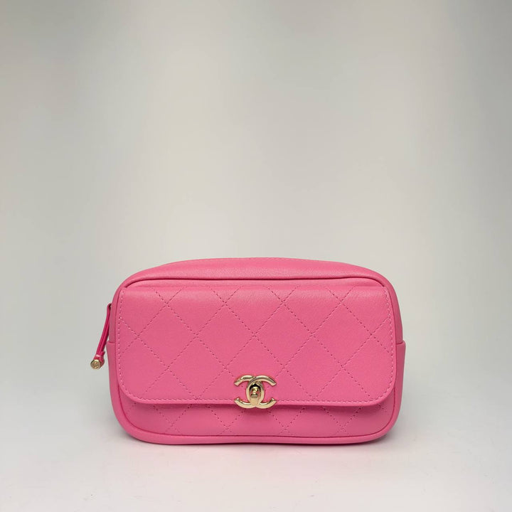 Chanel Casual Trip Waist Bag in pink quilted goatskin with CC turnlock flap pocket, front view