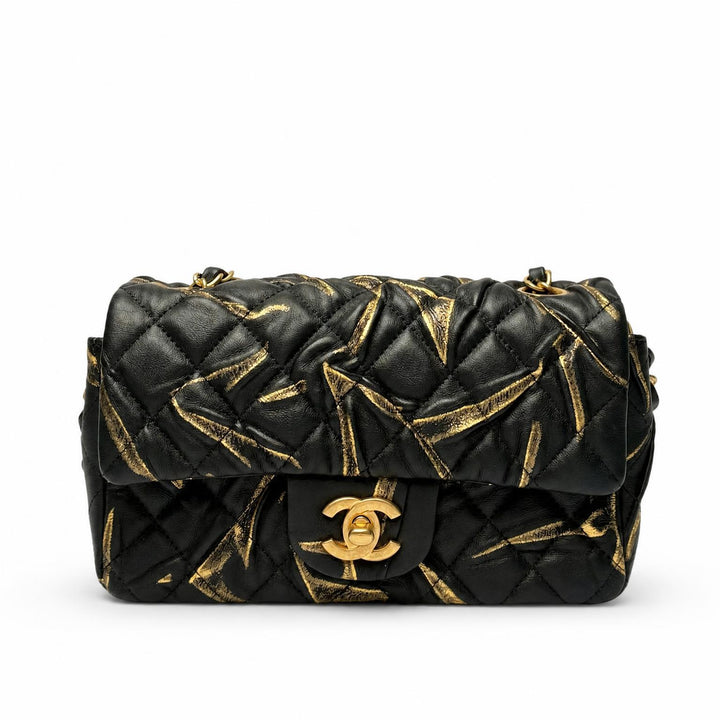 Chanel Mini Rectangular Flap Bag in black quilted leather with gold metallic streaks and gold-tone CC, front view