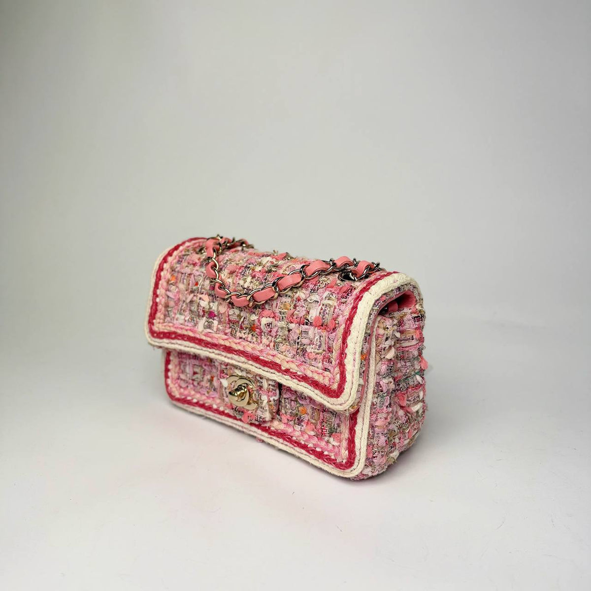 Chanel Mini Rectangular Flap Bag pink tweed, angled side view