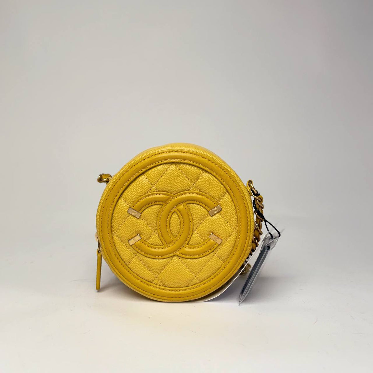 Chanel Filigree Round Clutch with Chain in yellow quilted caviar leather with gold hardware, front view