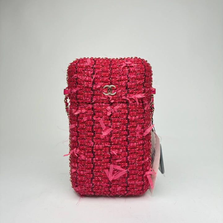Chanel Tweed Chain Around Phone Holder in red and pink fringed tweed with gold-tone hardware, front view
