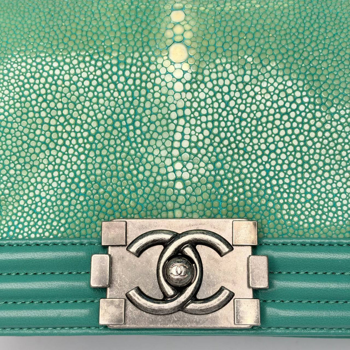 Chanel Boy Bag turquoise, close-up of the galuchat texture and antique-finish Boy clasp