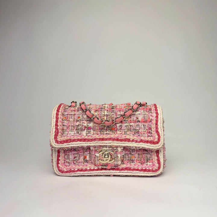 Chanel Mini Rectangular Flap Bag in pink tweed with braided trim and light gold-tone CC, front view