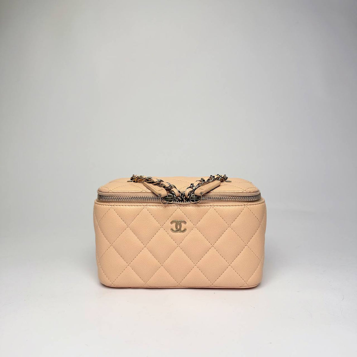 Chanel Small Vanity Case with Chain in light beige quilted caviar leather with gold hardware, front view