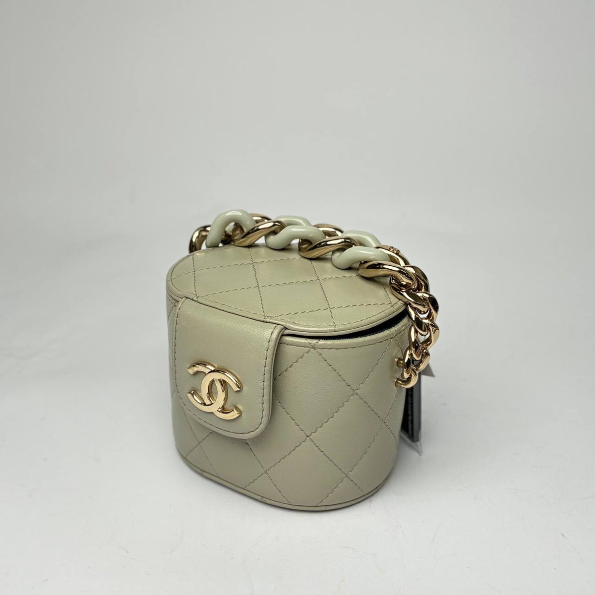 Chanel Mini Vanity Case lambskin, three-quarter view with the chunky two-tone chain handle