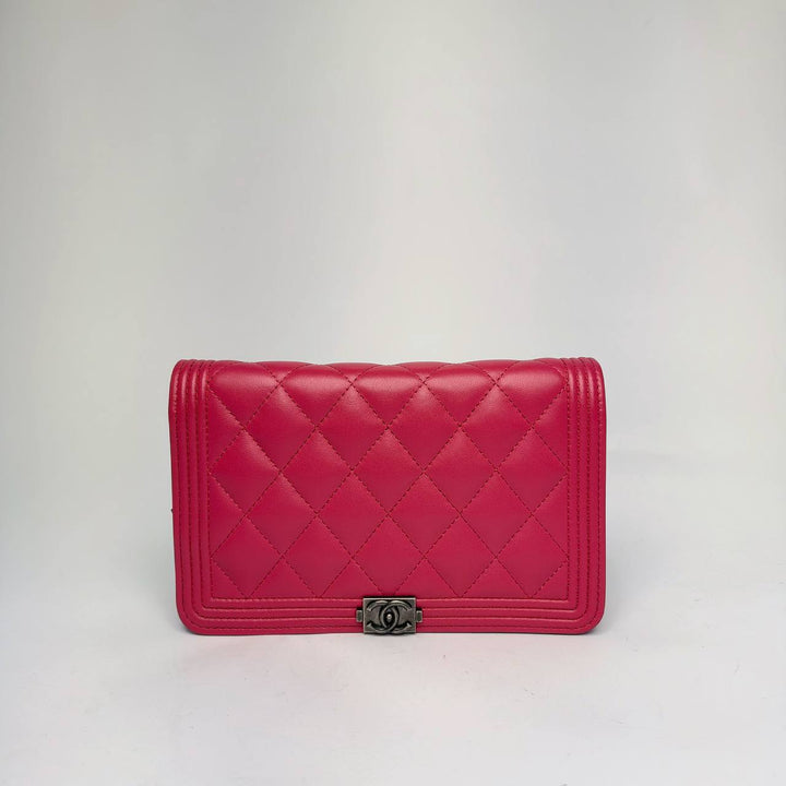 Chanel Boy Wallet on Chain in raspberry pink quilted leather with antique silver-tone Boy clasp, front view