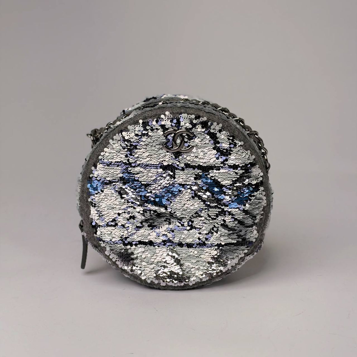 Chanel Round Clutch with Chain in silver, blue and black sequins with silver-tone CC logo, front view