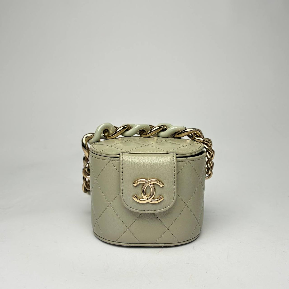 Chanel Mini Vanity Case with Chain in pale quilted lambskin with gold-tone hardware, front view