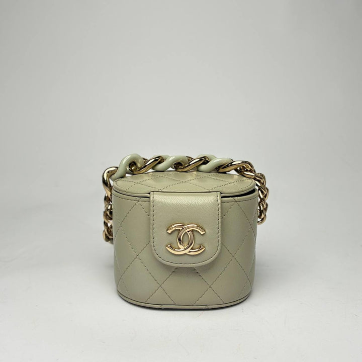 Chanel Mini Vanity Case with Chain in pale quilted lambskin with gold-tone hardware, front view