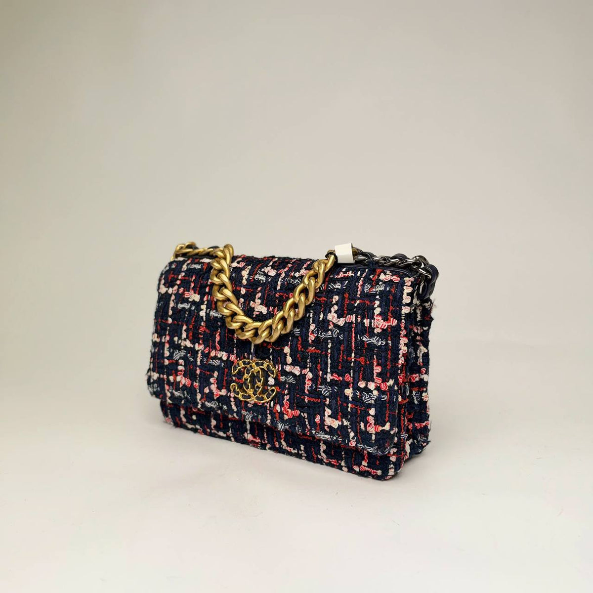 Chanel 19 Wallet on Chain navy tweed, angled side view