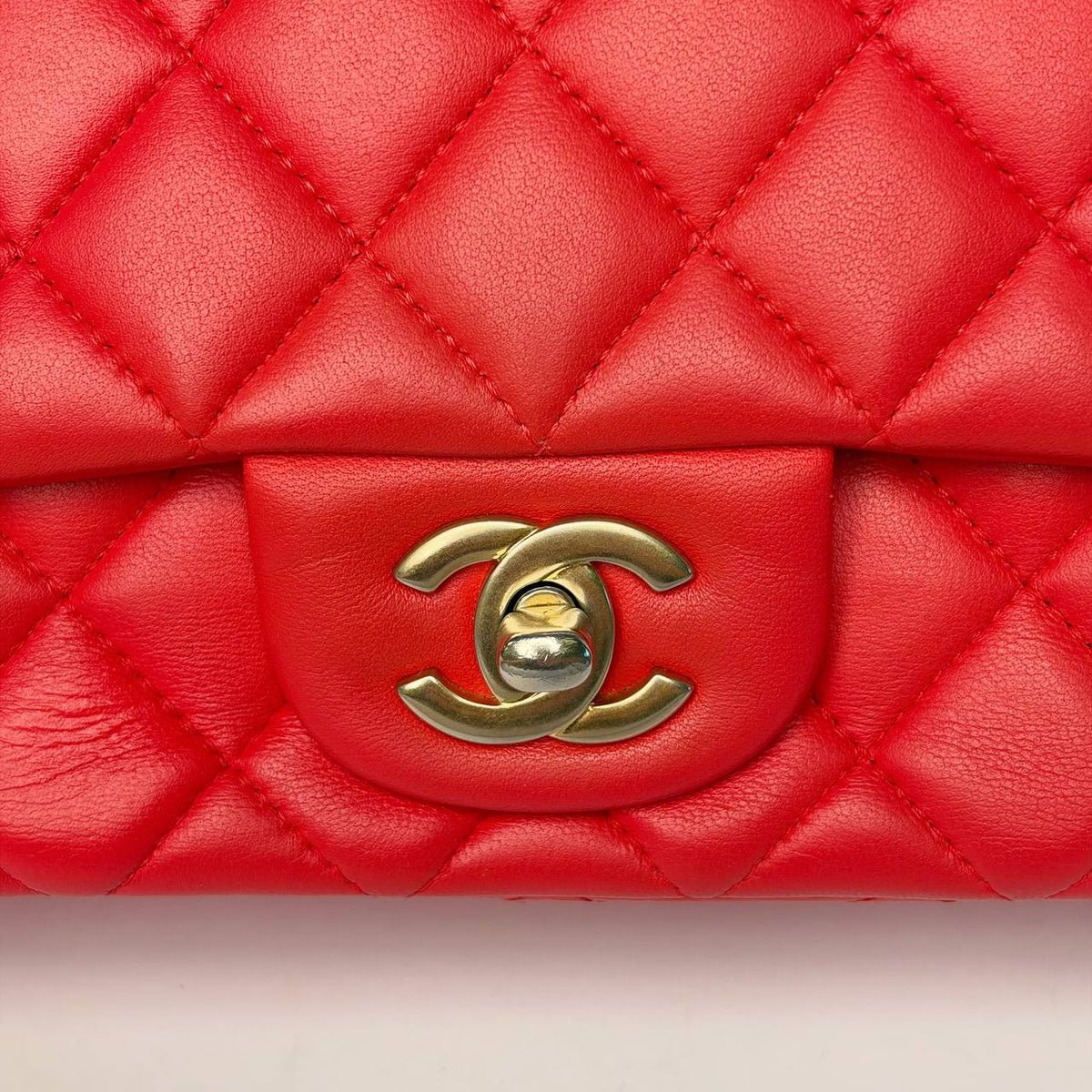 Chanel Mini Rectangular Flap Bag red, close-up of CC turnlock