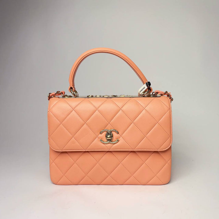 Chanel Trendy CC Top Handle Bag in peach-orange quilted lambskin with gold hardware, front view