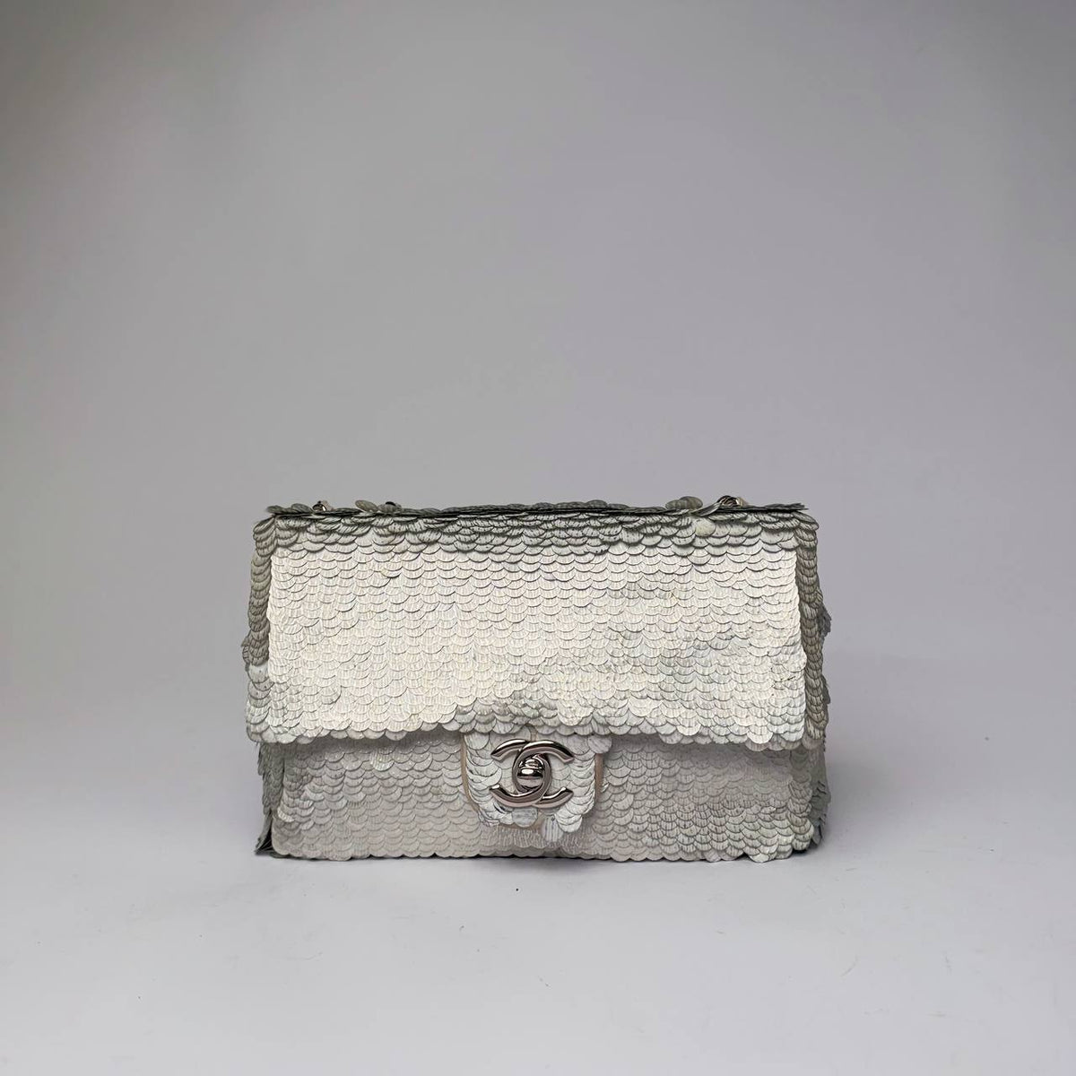 Chanel Classic Flap Bag in silver paillette sequins with silver-tone CC turnlock, front view