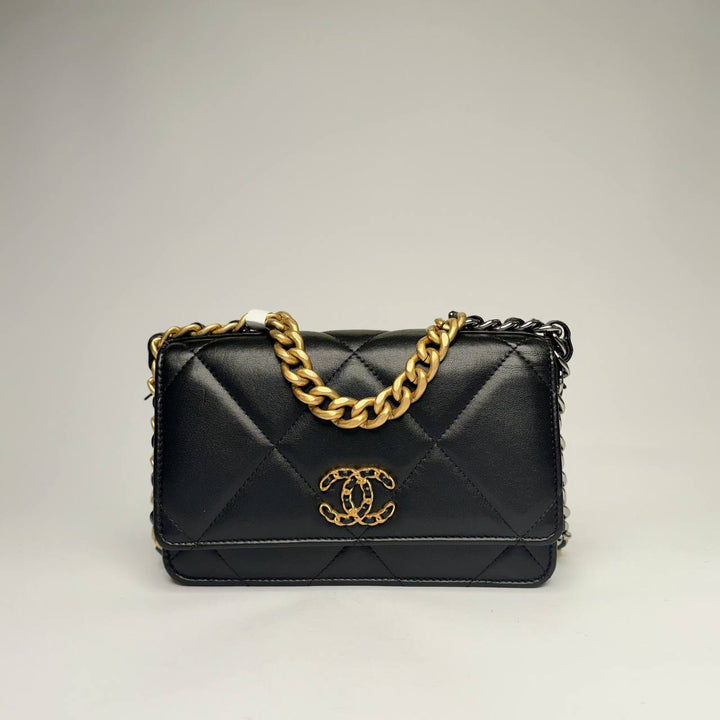 Chanel 19 Wallet on Chain in black quilted lambskin with gold-tone and silver-tone chain, front view
