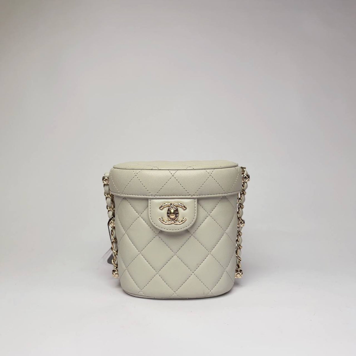 Chanel Mini Vanity Case with Chain in quilted leather with CC turnlock tab, front view