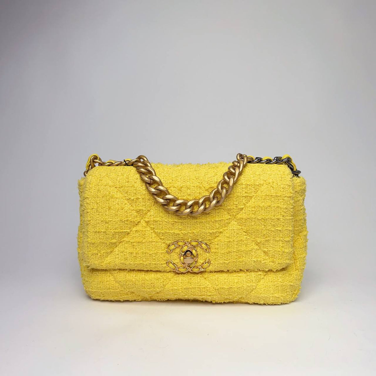 Chanel 19 Small Flap Bag in yellow quilted tweed with chunky gold-tone chain handle, front view