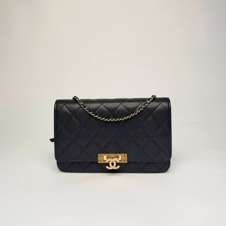 Chanel Golden Class Wallet on Chain in black quilted caviar leather with gold hardware, front view