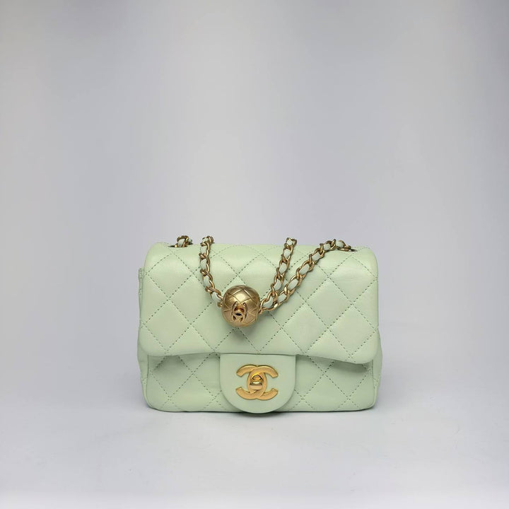 Chanel Pearl Crush Mini Flap Bag in light green quilted leather with gold-tone hardware, front view